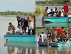 Jaga Kelestarian Ekosistem dan Tingkatkan Potensi Masyarakat Bupati Pelalawan Bersama Wakil Bupati Lepas 13 Ribu Bibit Ikan Patin